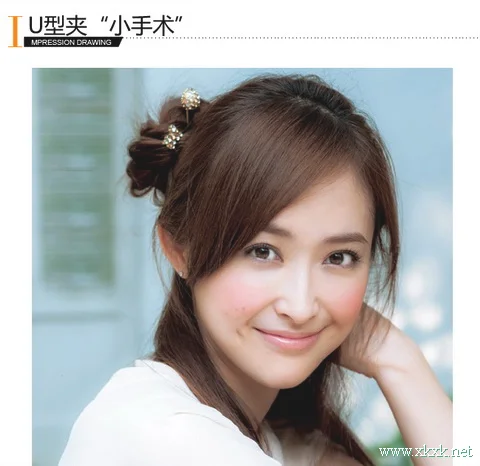 小发夹大作用 给发型来个美容“小手术”