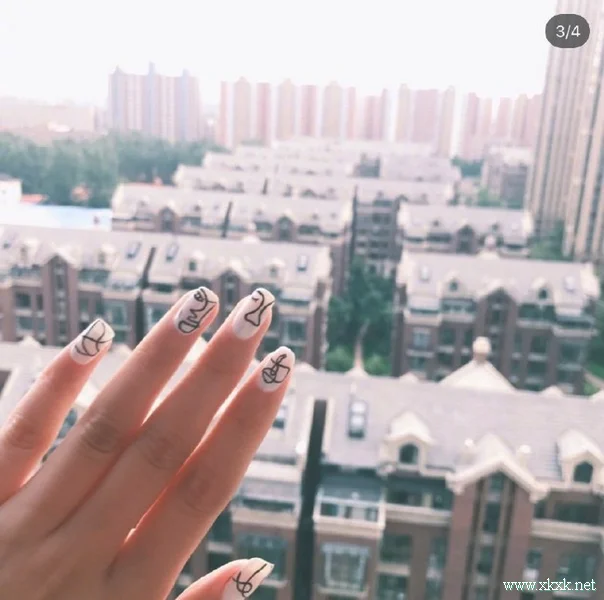 很酷很文艺，抽象人物线条美甲图片
